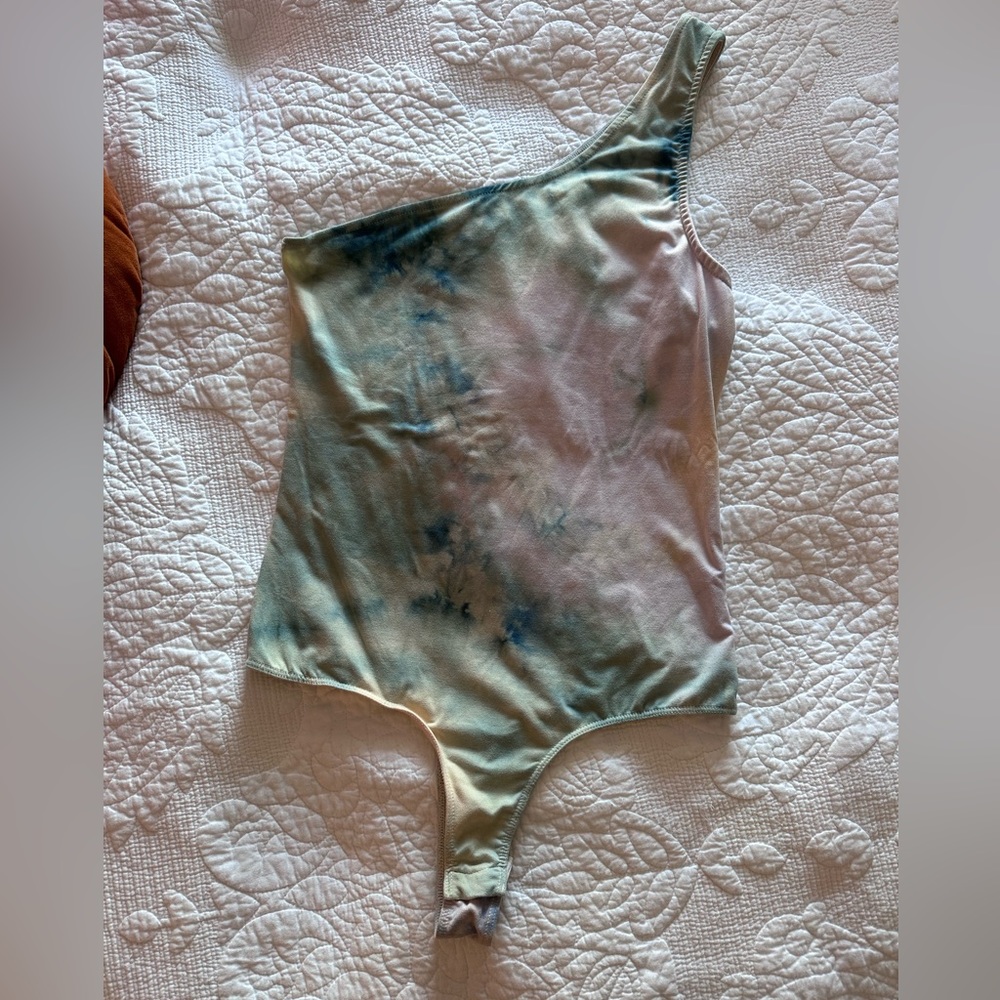 Pastel one shoulder body suit